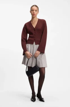 Wool-blend cardigan with logo rivet