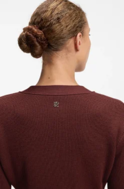 Wool-blend cardigan with logo rivet