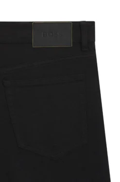 Year of the Horse Tapered-fit jeans in laser-patterned black denim