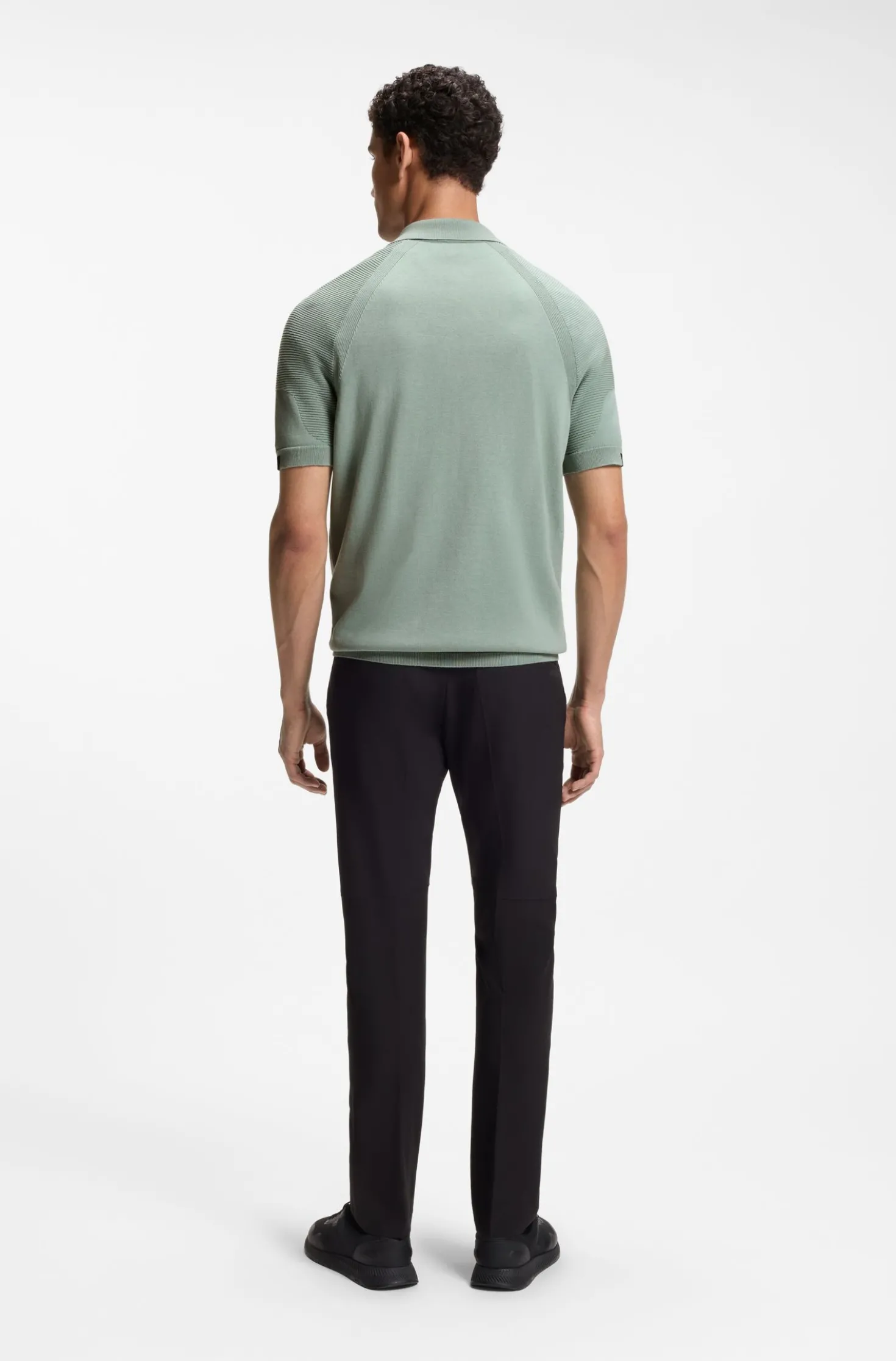 Zip-neck knit polo with body-mapping design